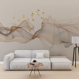 A minimalist abstract wallpaper with flowing lines in shades of gray and gold, accented by a flock of golden birds.