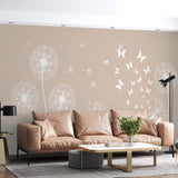 Fototapeta sylwetka mniszka lekarskiego na beżowym tle tapeta w pastelowe kwiaty