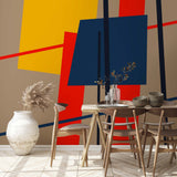 Abstrakcyjna tapeta ścienna z grafiką współczesną - odważny geometryczny wzór w kolorze czerwonym, niebieskim i żółtym