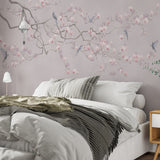 Tapeta z motywem wiosennych kwiatów i ptakami Fototapeta z różowymi kwiatami