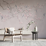 Tapeta z motywem wiosennych kwiatów i ptakami Fototapeta z różowymi kwiatami