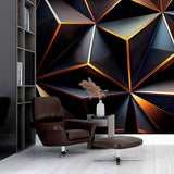 A dark, abstract wallpaper featuring a geometric pattern of overlapping triangles in shades of black and gold.