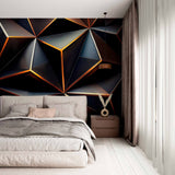 A dark, abstract wallpaper featuring a geometric pattern of overlapping triangles in shades of black and gold.