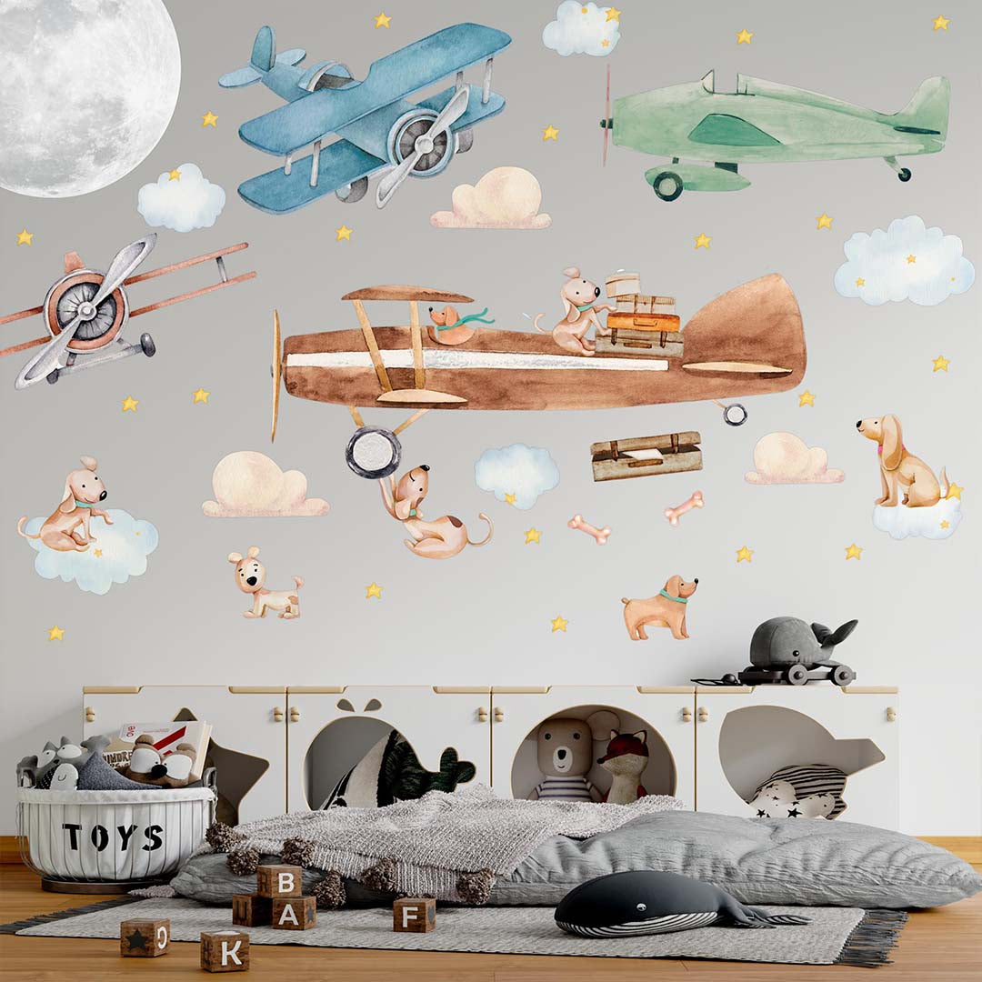 A playful scene with vintage airplanes, cute dogs, clouds, stars, and luggage, perfect for a child's room.