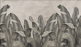 wallpaper featuring a row of large, stylized banana leaves in shades of gray against a textured background.