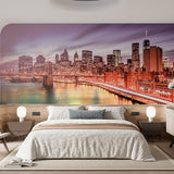 Naklejka na ścianę tętniący życiem nocny pejzaż miejski - oświetlona panorama Nowego Jorku i Most Brookliński