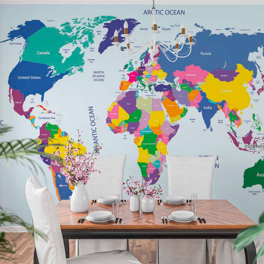 Bright political world map wallpaper in a dining room.