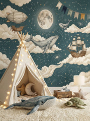 Ocean space wallpaper with flying whale, moon, constellations, clouds, airship and vintage sailing ship behind a kids play area.
