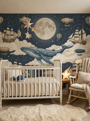 Adventure nursery wallpaper featuring a blue whale flying through clouds beneath a full moon with ships and airships.