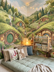 Storybook rabbit village mural with green countryside, round burrow doors and bunny characters behind a kids bed.