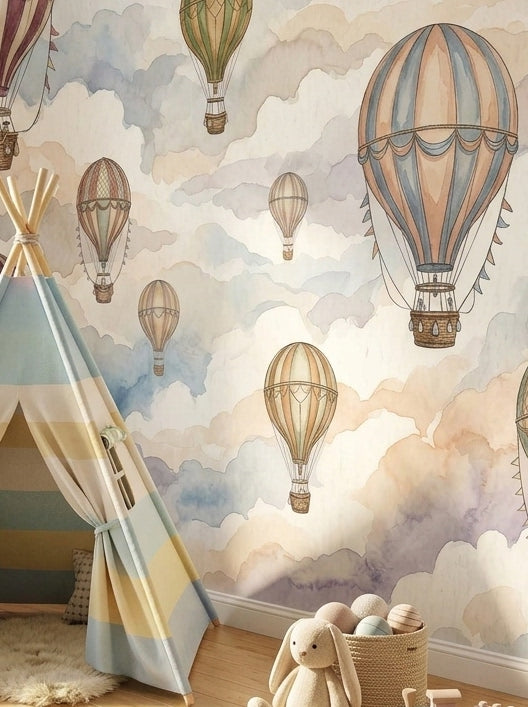 Close-up of watercolor balloon wallpaper showing vintage hot air balloons floating among soft pastel clouds.