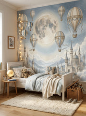 Blue fantasy kids wallpaper with large moon, vintage balloons, dreamy castles and soft watercolor cloud landscape.