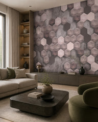 Pink and grey 3D hexagon wallpaper in a designer living room.
