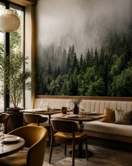 Foggy evergreen forest wallpaper in a restaurant.