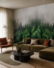 Misty pine forest wallpaper in a designer living room.