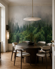 Misty pine forest wallpaper in a refined dining area.