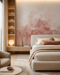 Blush pink abstract watercolor wall mural in a designer bedroom.