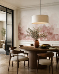 Blush pink abstract watercolor wall mural in a refined dining area.