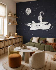 Astronaut riding a space shuttle kids’ wall mural in a children’s playroom.
