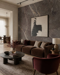 Dark grey marble wallpaper in a designer living room.