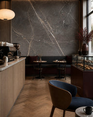 Dark grey marble wallpaper in a specialty coffee shop.