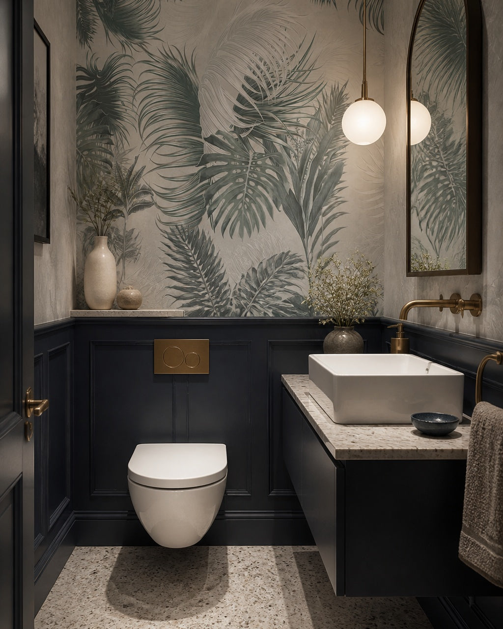 Soft green palm leaves wallpaper in an elegant powder room.