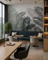 Monochrome palm fronds wallpaper in a creative office lounge.