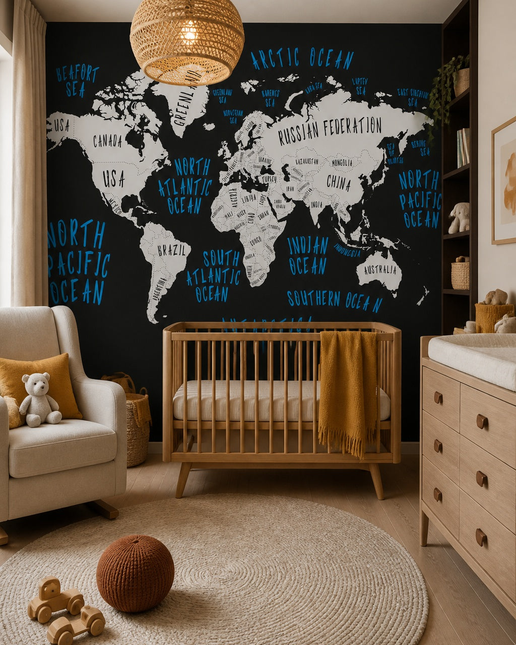 Black and white world map wallpaper in a modern nursery with a crib.