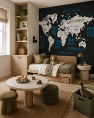 Black and white world map wallpaper in a boy’s bedroom.