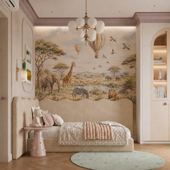 Watercolor safari animal mural displayed behind a pastel children’s daybed