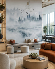 Misty mountain forest wallpaper in a creative office lounge.