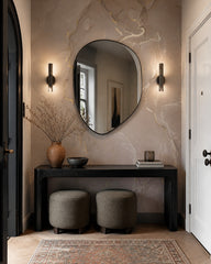 Beige liquid ink wallpaper in a refined foyer.