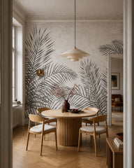 Dark fern fresco wallpaper in a refined dining area.
