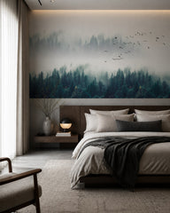 Misty evergreen forest wallpaper in a designer bedroom.