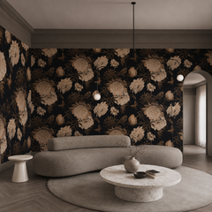 Dark peony and bird wallpaper in a modern living room with a curved boucle sofa.