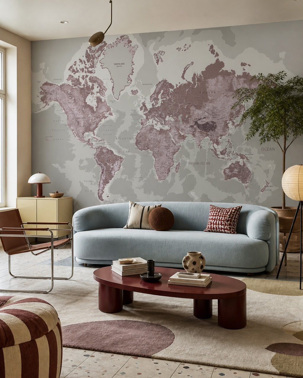 Mauve world map wallpaper in a designer living room.