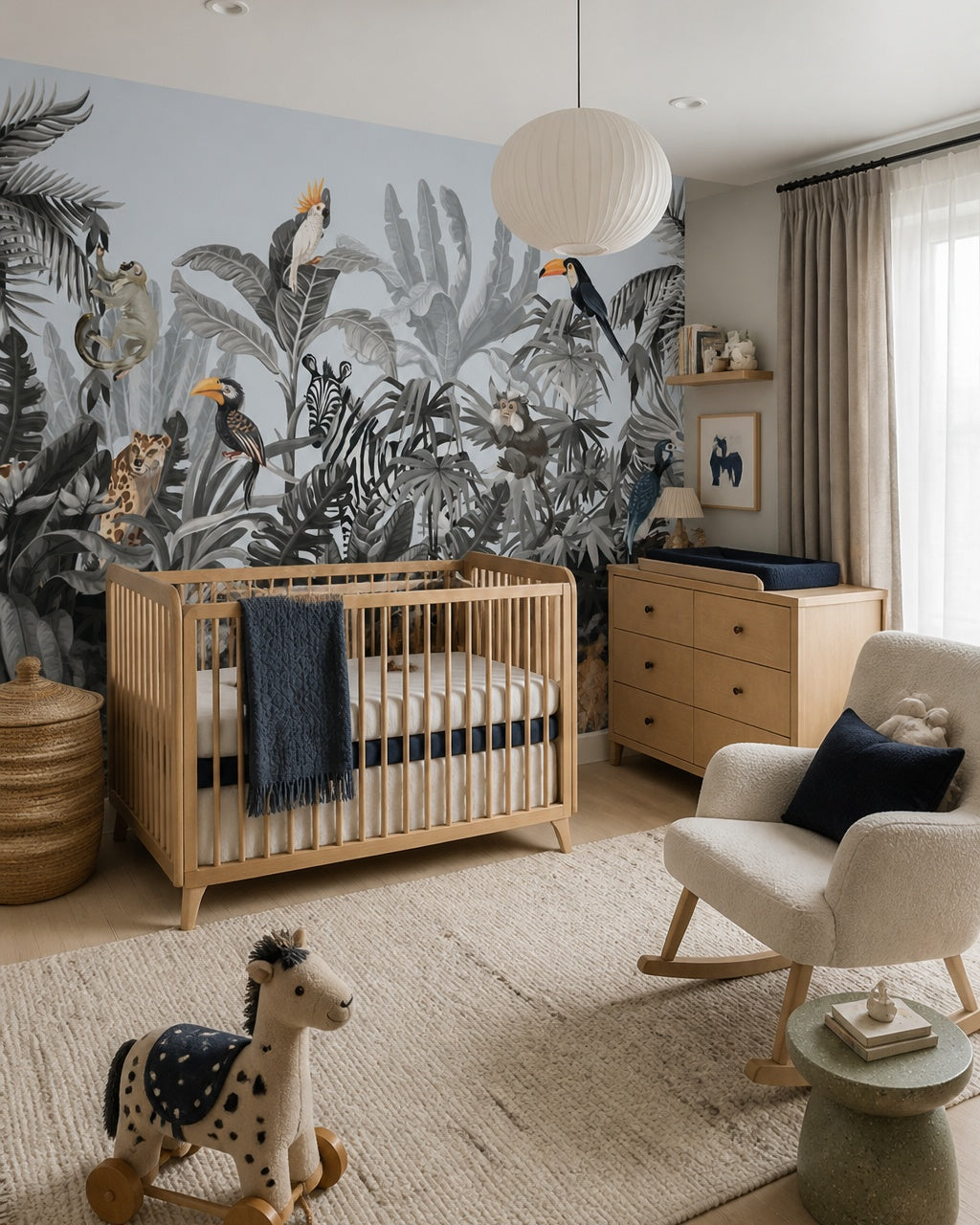 Toucan jungle wallpaper in a modern nursery with a crib.