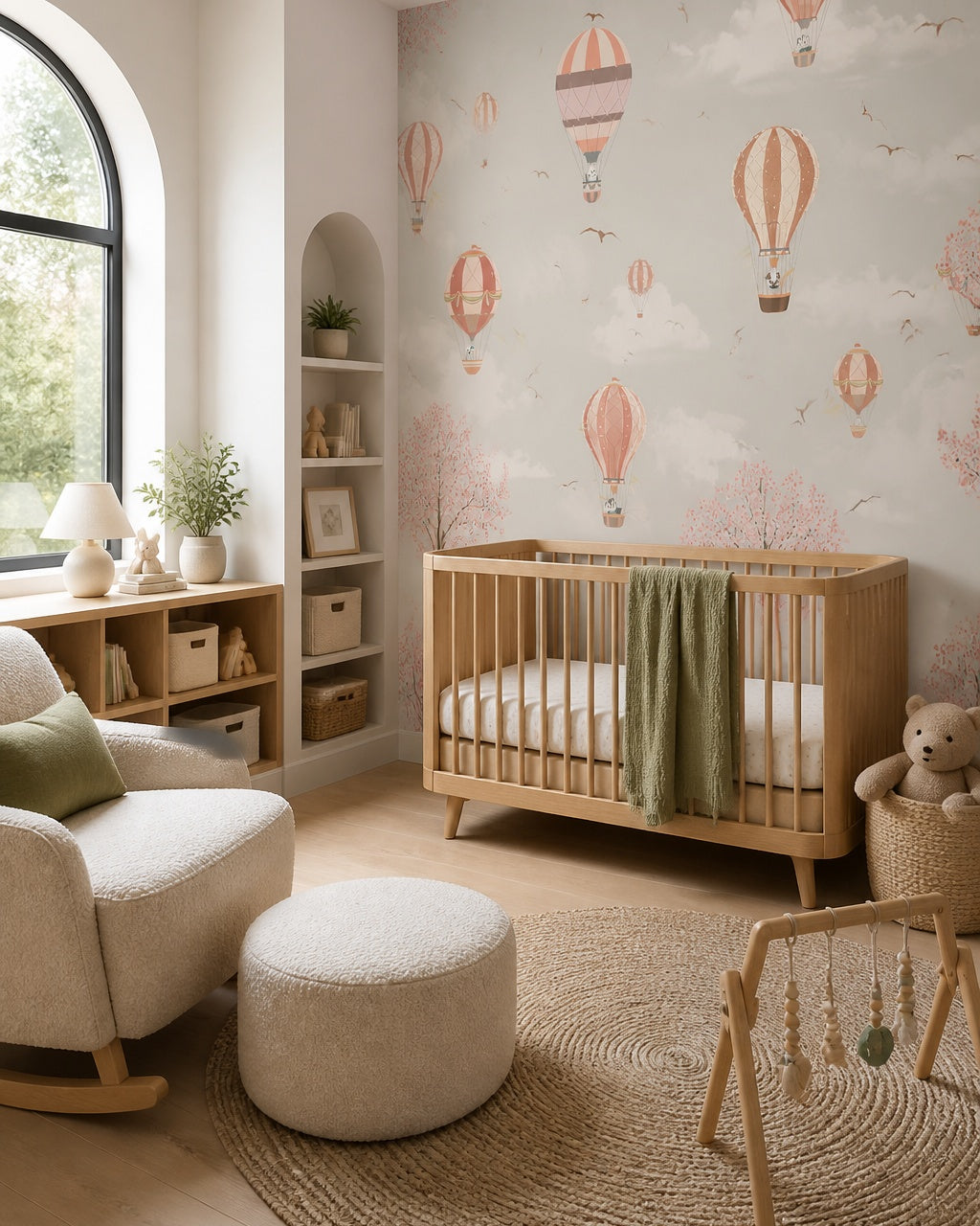 Terracotta hot air balloons wallpaper in a modern nursery with a crib.