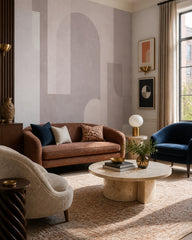 Pastel geometric shapes wallpaper in a designer living room.