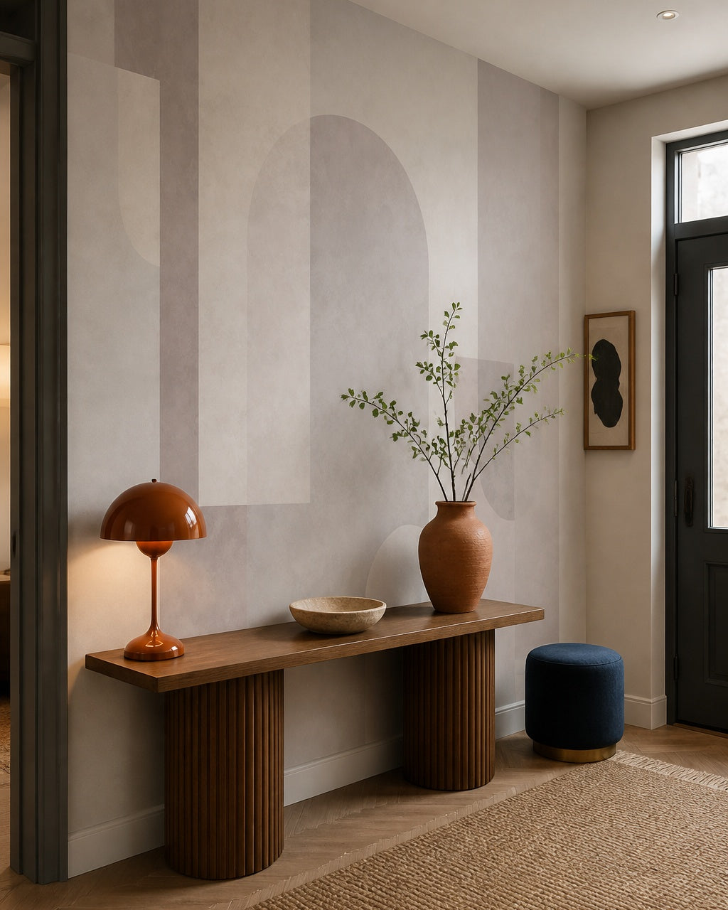 Pastel geometric shapes wallpaper in a designer entrance hall.