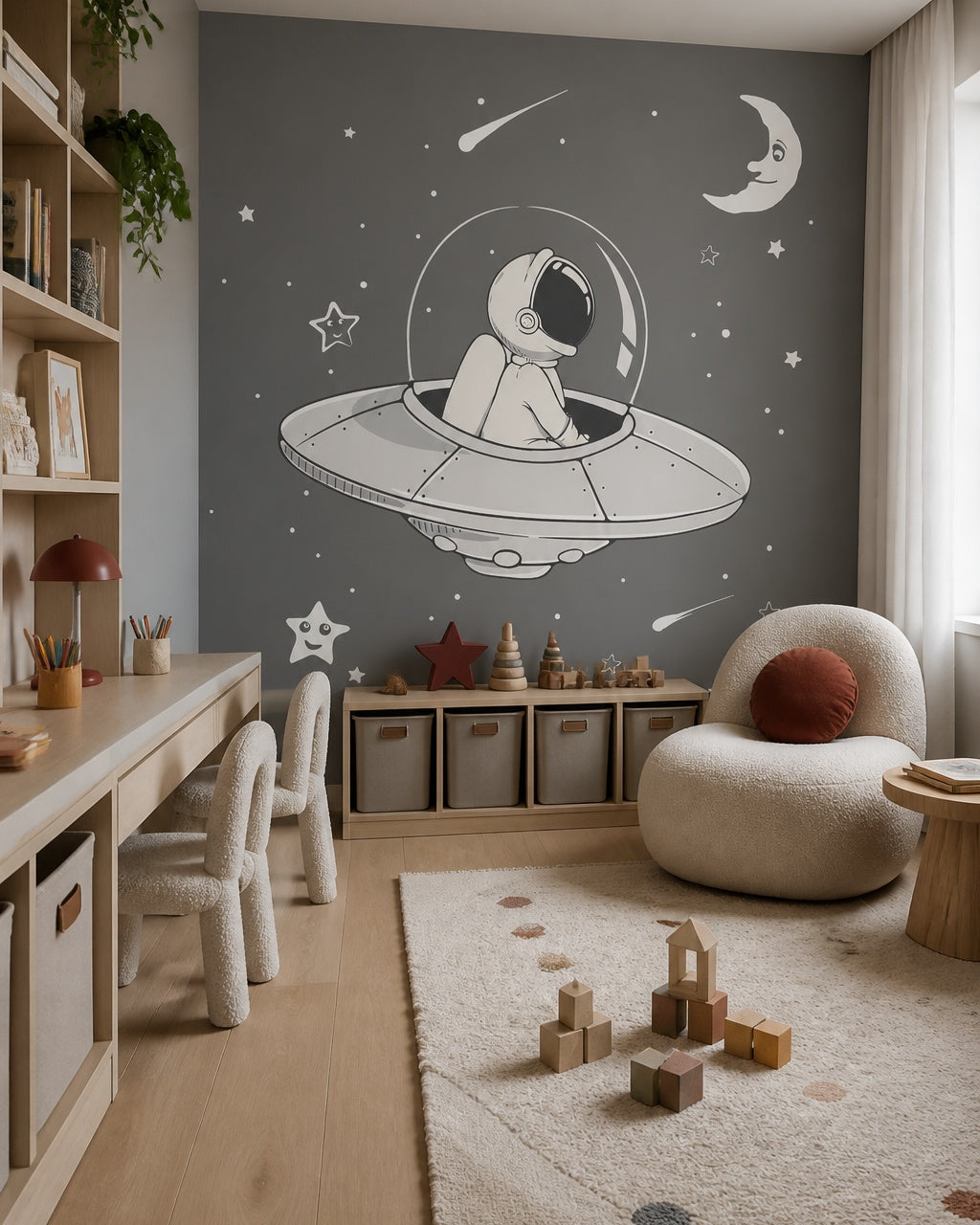 Astronaut in a flying saucer space wall mural in a children’s playroom.