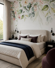 Watercolor floral garland wallpaper in a designer bedroom.