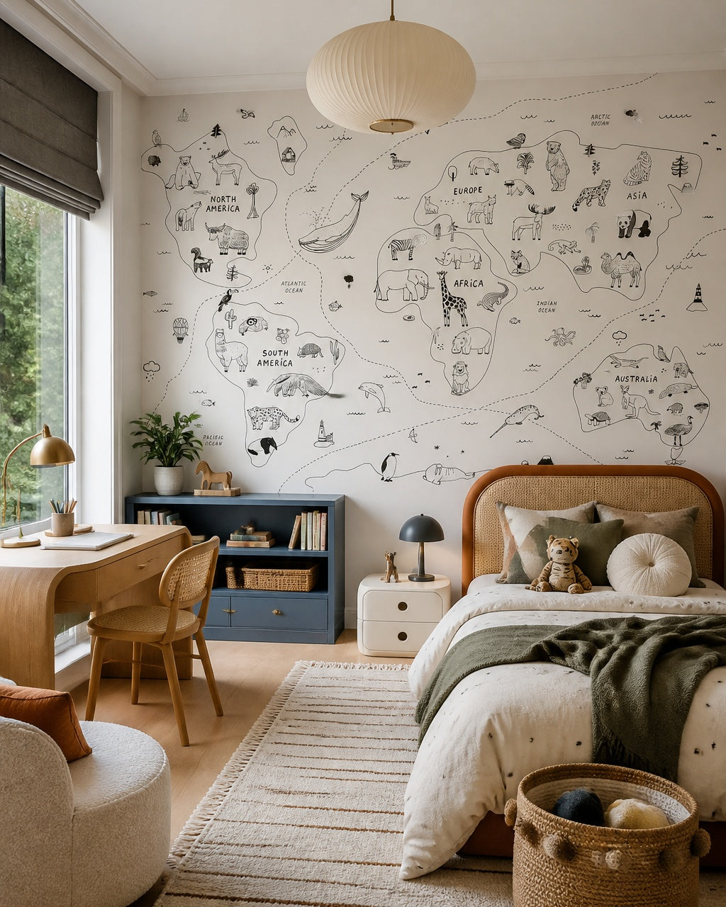 Hand-drawn animals of the world map wall mural in a girl’s bedroom.
