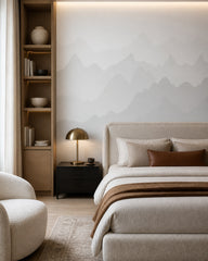 Grey mountain silhouettes wallpaper in a designer bedroom.