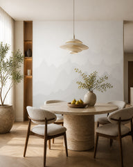 Grey mountain silhouettes wallpaper in a refined dining area.