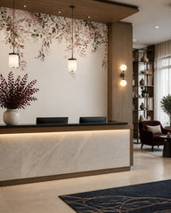 Hanging flowers wallpaper at a hotel reception desk.