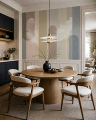 Feather and stripe wallpaper in a refined dining area.