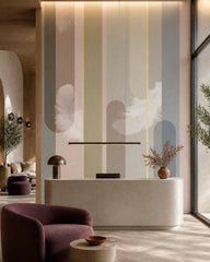 Feather and stripe wallpaper in a boutique hotel lobby.