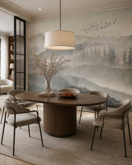 Serene mountain landscape wallpaper in a refined dining area.
