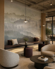 Serene mountain landscape wallpaper in a creative office lounge.